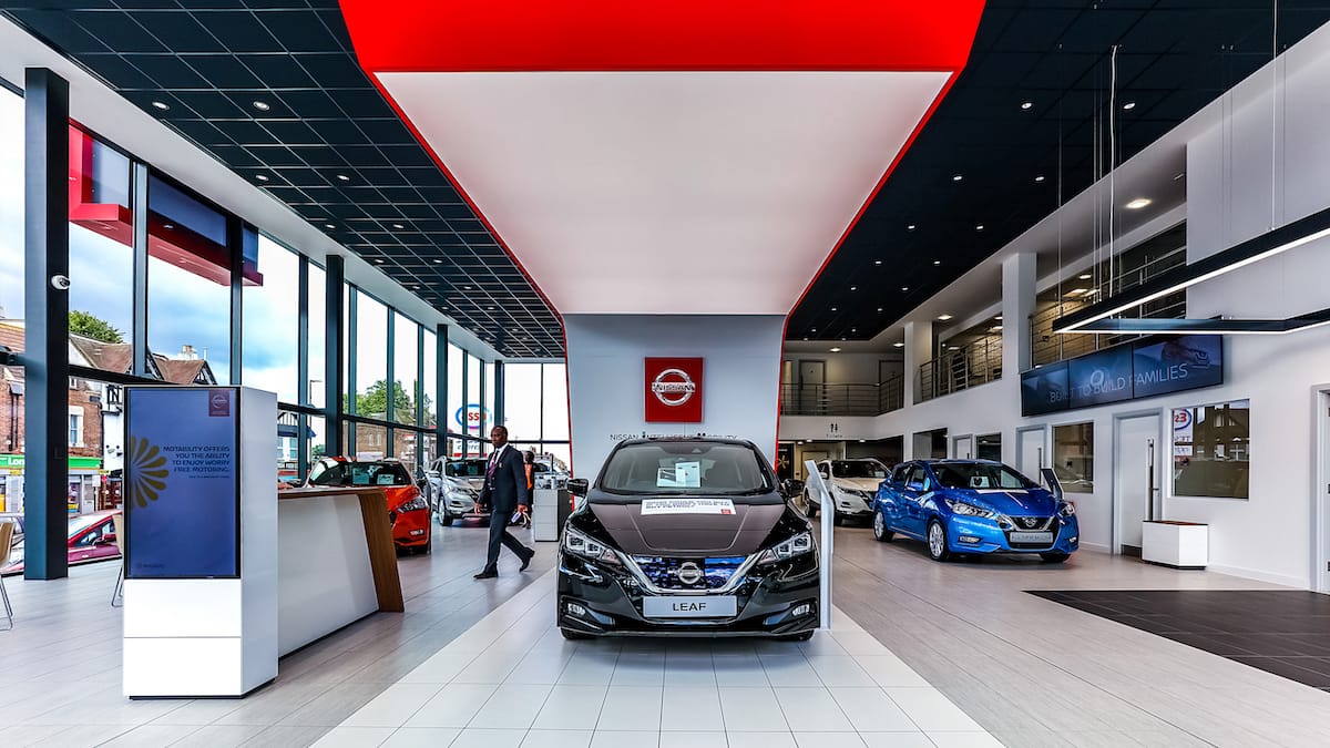 Modern car showroom with vehicles on display