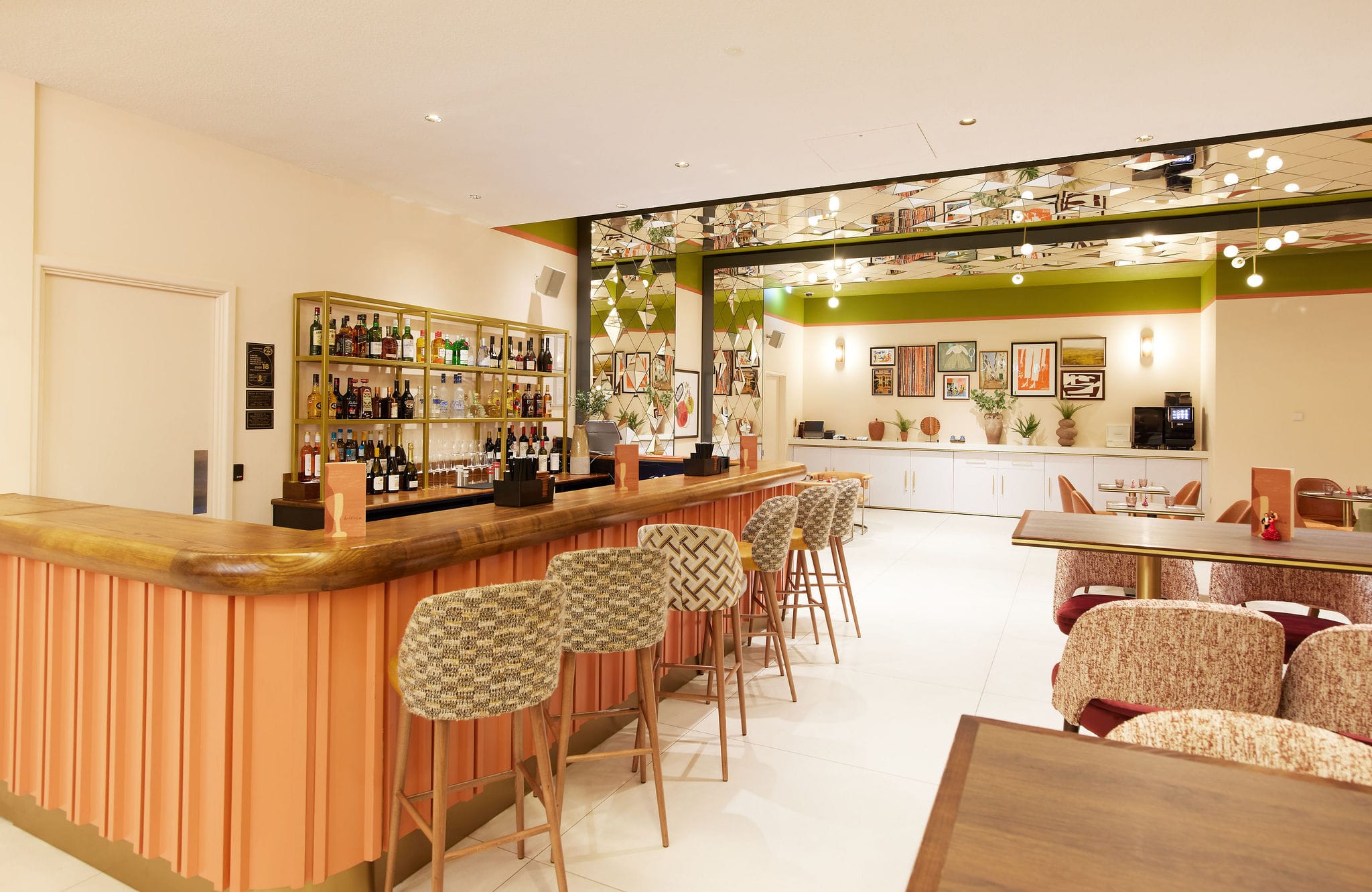 Modern bar with stylish seating and warm lighting