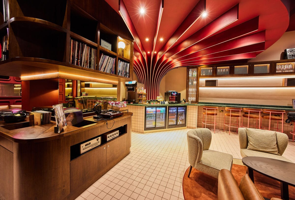 Modern bar interior with retro design and seating area