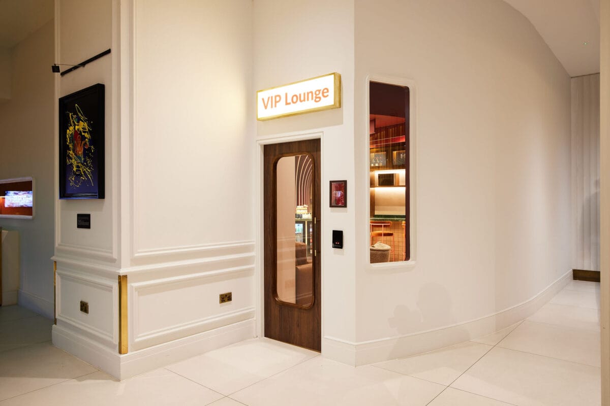 Entrance to modern VIP lounge with warm lighting